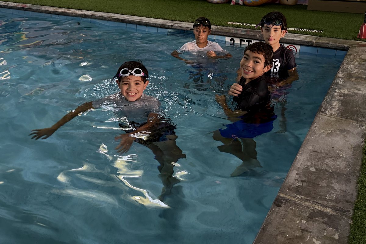 LFG Academy students swimming a lane during swim class
